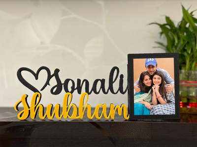 Black & gold couple name with frame